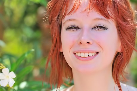 Playful and nerdy redheaded teen shows her hot body in public