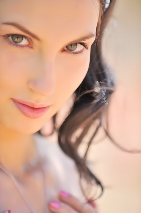 Brunette in sexy lingerie showcasing her body and beautiful boobies