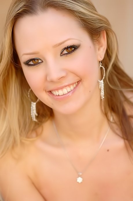 Topless babe finally decides to pull down her tiny panties and show it off