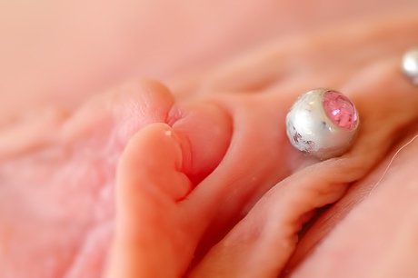 Blue-eyed blonde gives you hot close-ups of her pierced pussy