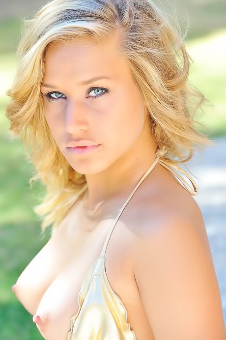 Adorable young blonde pushes her panties deep inside of that pussy