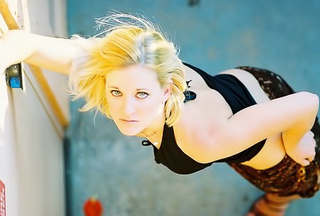 Blond haired sub exposing her pretty titties while in public