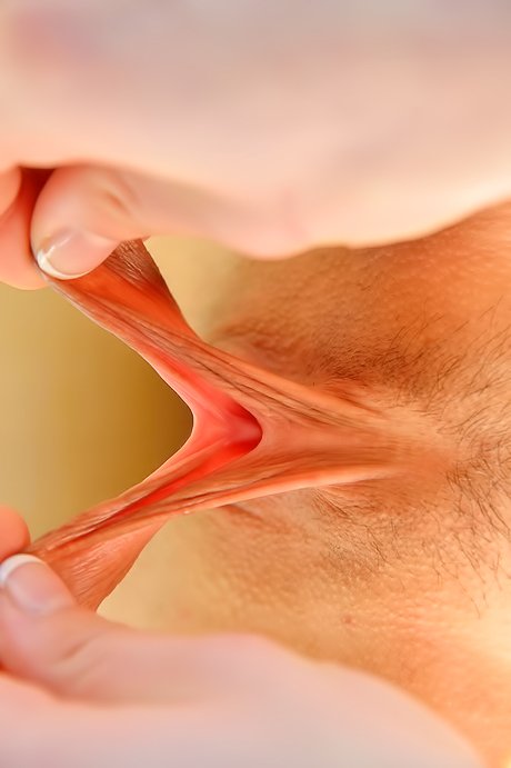 Skinny seductress in knee-high white socks flashing her hot pussy